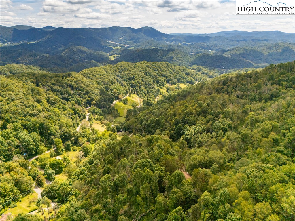 2811 Georges Gap Road Vilas, NC 28692 - Photo 41 of 50 a view of a mountain range with lush green hillside