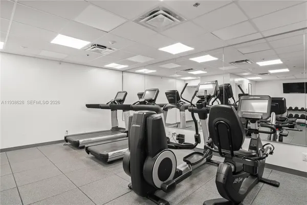 a view of a room with gym equipment