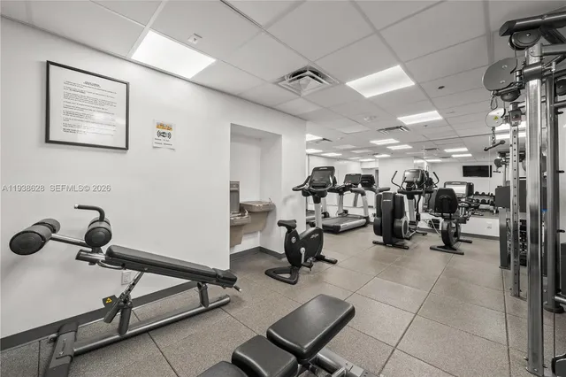 a view of parking garage with cars