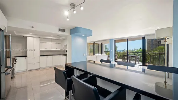 a room with lots of counter space and furniture