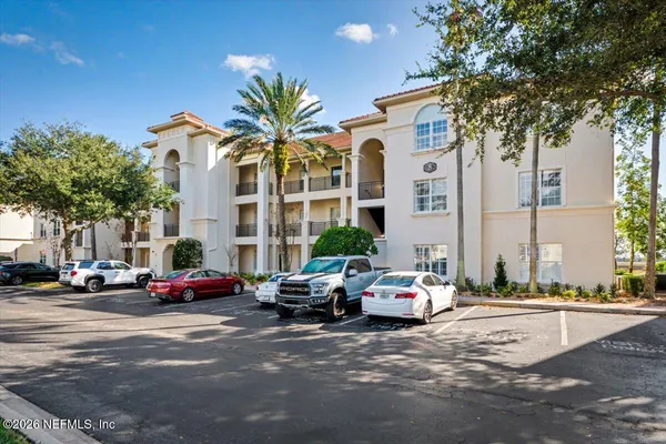 a cars parked in front of a building