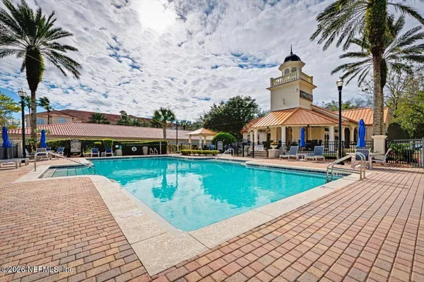 swimming pool with outdoor seating