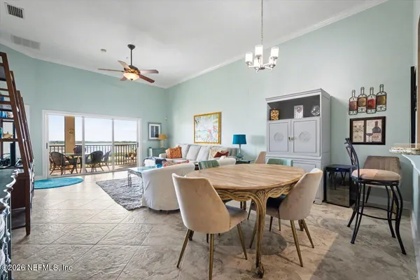 a view of a dining room with furniture