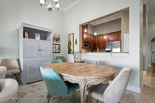 a view of a dining room with furniture