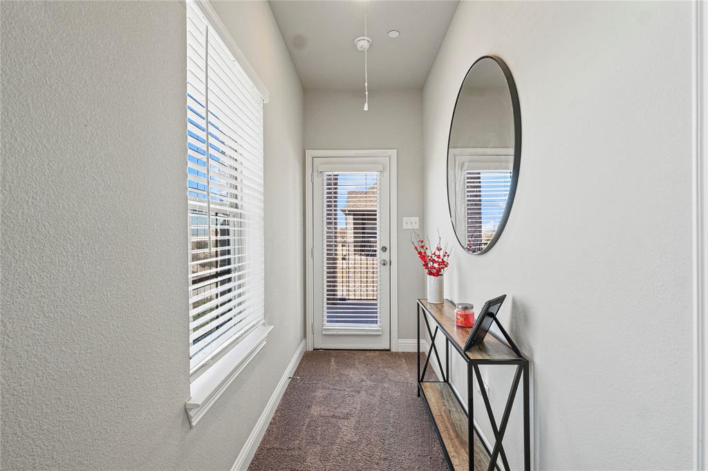 8010 Foraker Street Frisco, TX 75034 - Photo 12 of 14 an entryway in wooden floor with windows