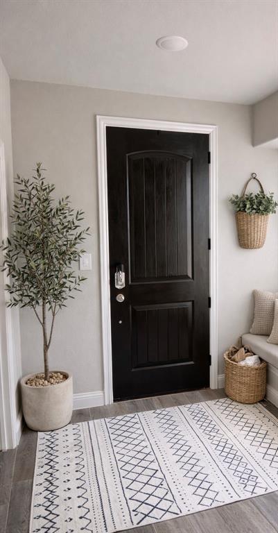 8010 Foraker Street Frisco, TX 75034 - Photo 2 of 17 a bedroom with a bed and a potted plant