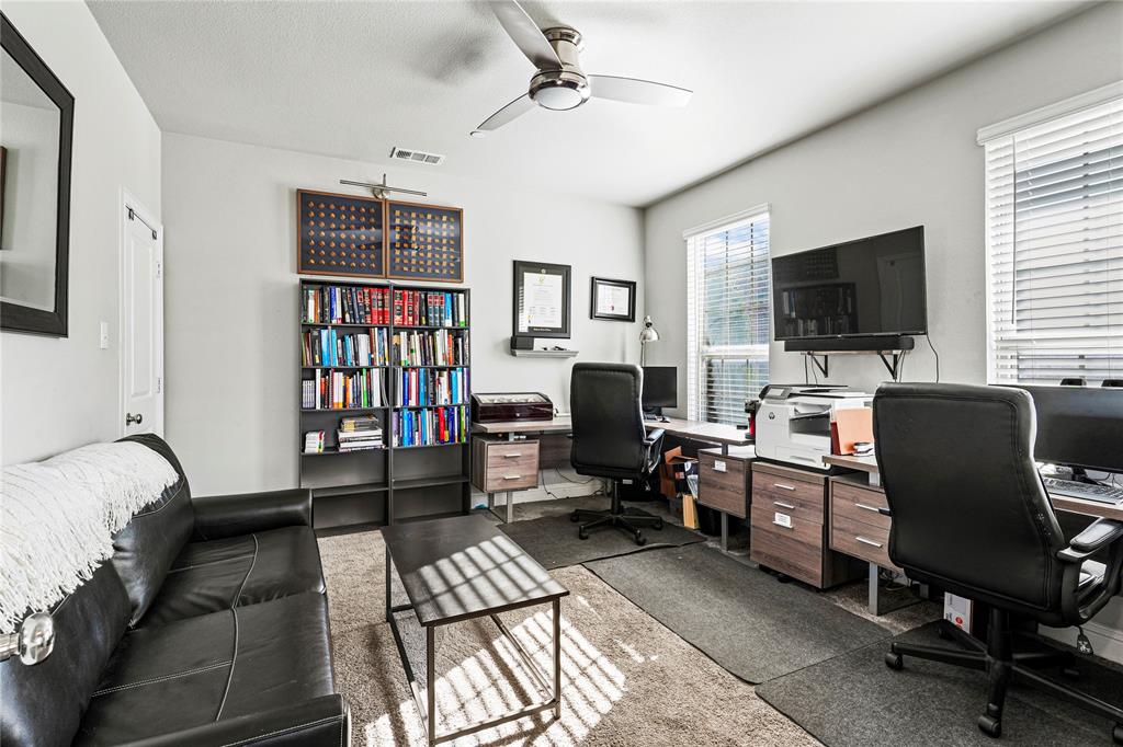 8010 Foraker Street Frisco, TX 75034 - Photo 3 of 13 a view of a livingroom with workspace and a window