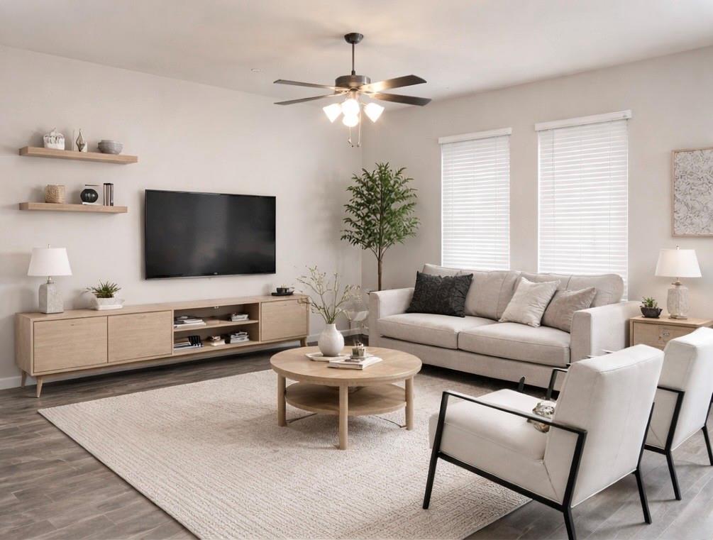 8010 Foraker Street Frisco, TX 75034 - Photo 7 of 17 a living room with furniture and a flat screen tv