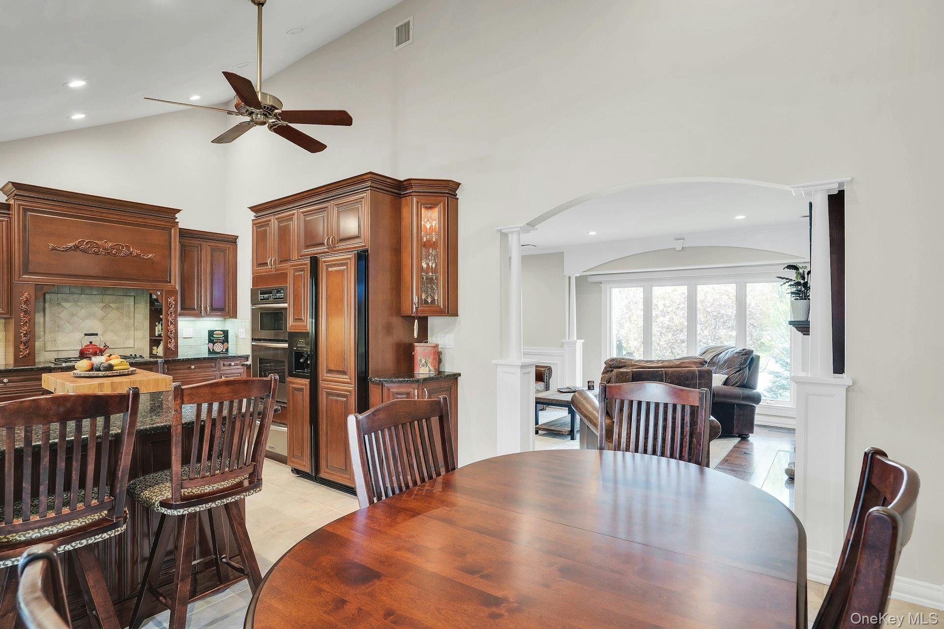 101 Hayrick Lane Commack, NY 11725 - Photo 15 of 50 a view of a dining room with furniture