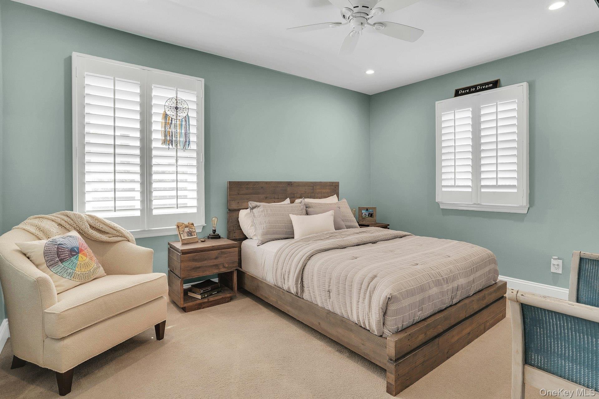101 Hayrick Lane Commack, NY 11725 - Photo 26 of 50 a bedroom with a bed couch and window
