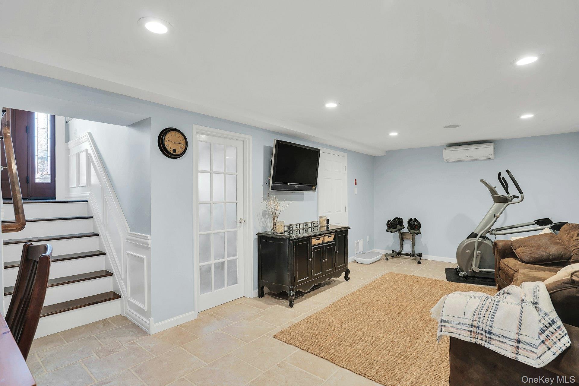 101 Hayrick Lane Commack, NY 11725 - Photo 30 of 50 a bedroom with furniture and flat screen tv