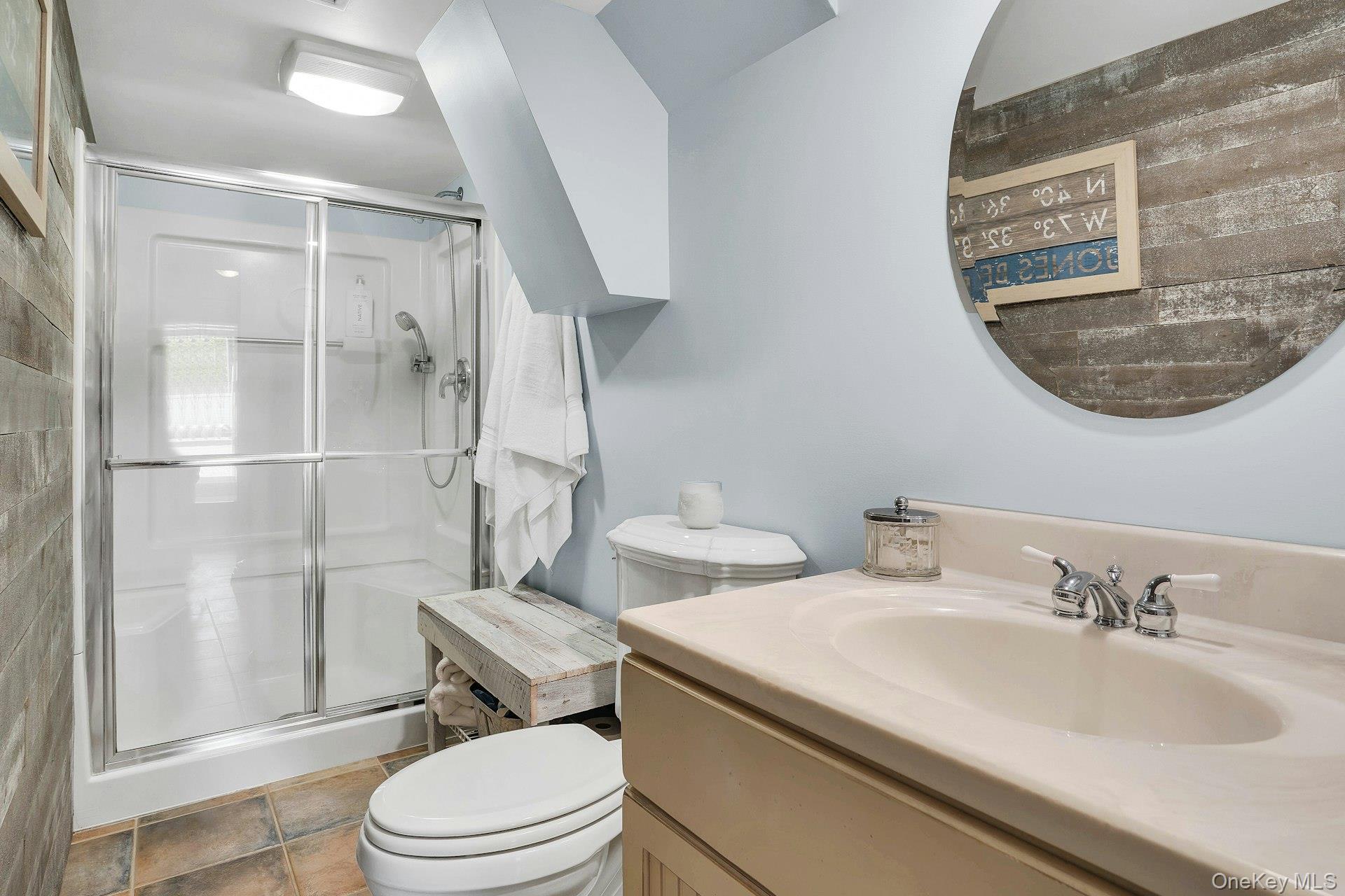 101 Hayrick Lane Commack, NY 11725 - Photo 32 of 50 a bathroom with a sink toilet and shower