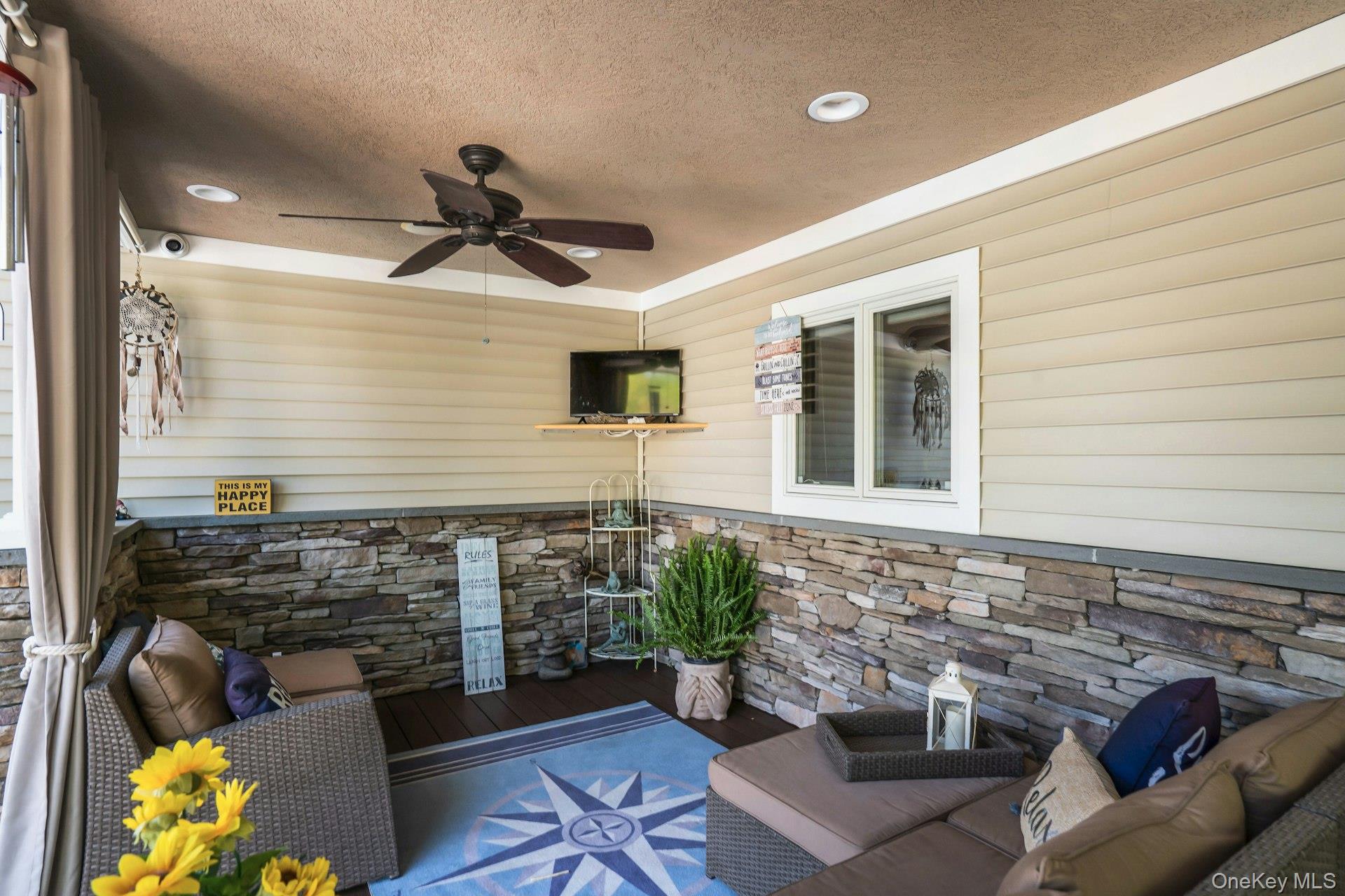 101 Hayrick Lane Commack, NY 11725 - Photo 33 of 50 a front view of a house with patio