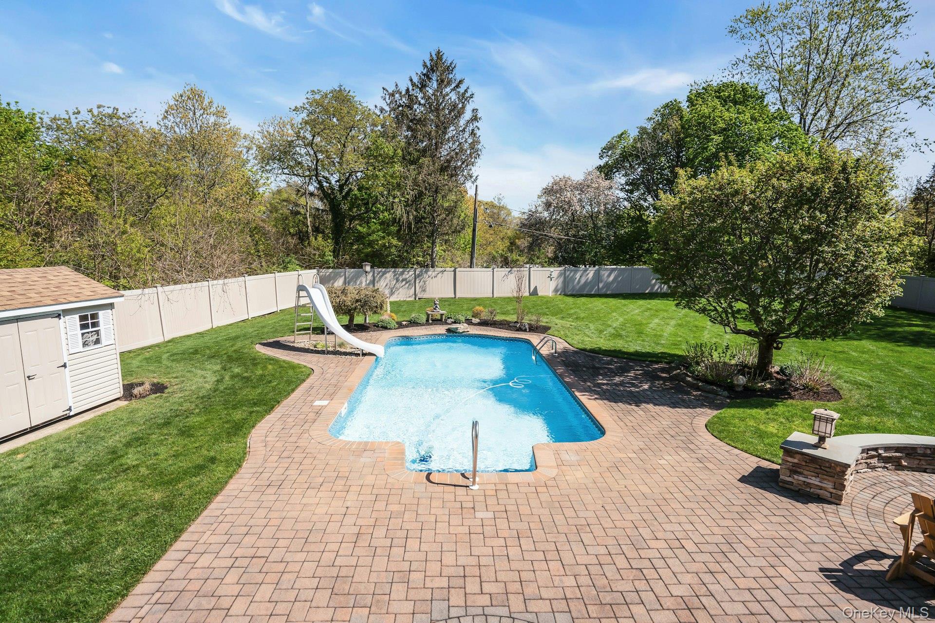 101 Hayrick Lane Commack, NY 11725 - Photo 38 of 50 a view of a park with swings