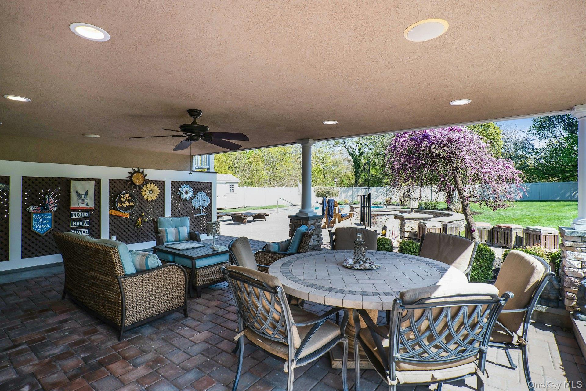 101 Hayrick Lane Commack, NY 11725 - Photo 42 of 50 a dining room with furniture and a large window