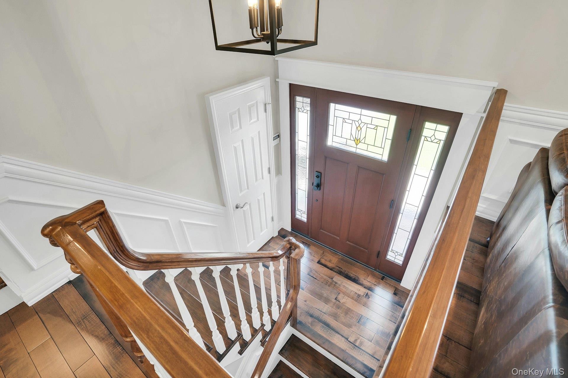 101 Hayrick Lane Commack, NY 11725 - Photo 5 of 50 a view of an entryway with hardwood