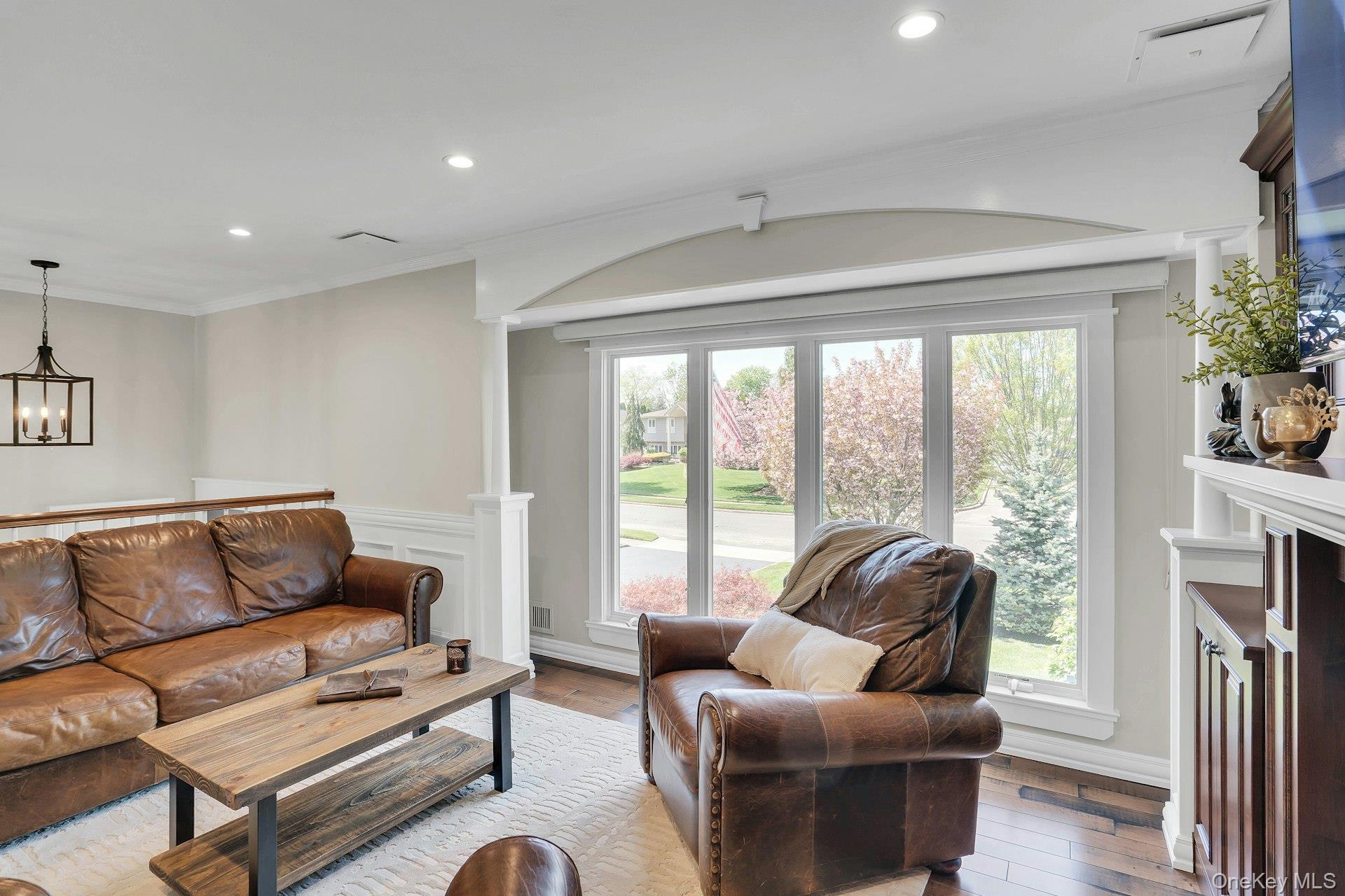 101 Hayrick Lane Commack, NY 11725 - Photo 9 of 50 a living room with furniture and a large window