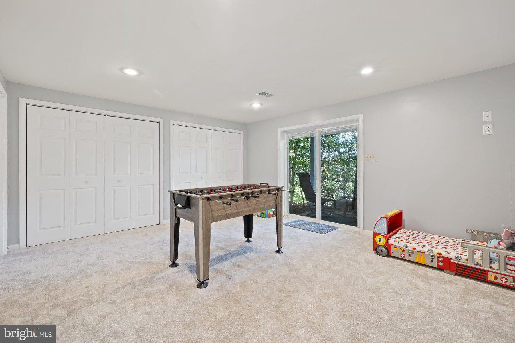 6524 Rimrock Road New Market, MD 21774 - Photo 31 of 59 Walk-out basement with new carpeting throughout.