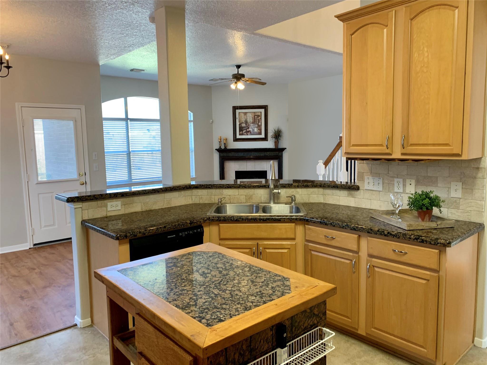 11218 Timbertree Lane Houston, TX 77070 - Photo 1 of 39 Beautifully updated kitchen with a moveable island.