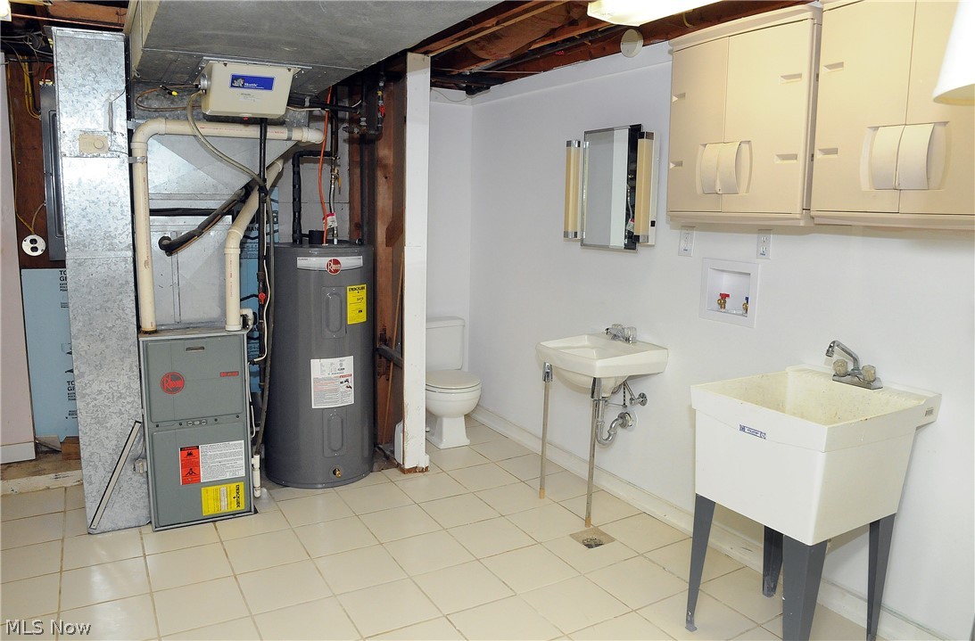 131 Merrick Road Cambridge, OH 43725 - Photo 22 of 33 Utility/laundry/half bath