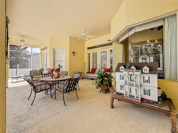 a dining room with furniture and outdoor view