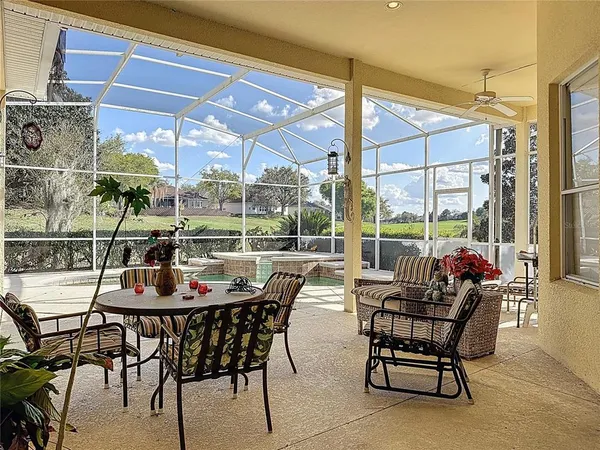 a view of a swimming pool with a porch