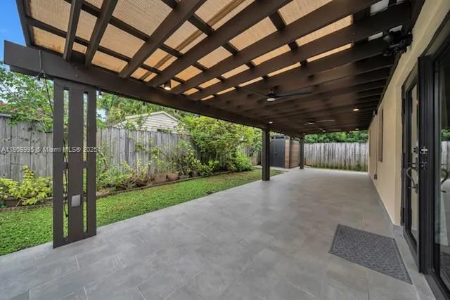 a view of a backyard of the house