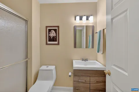 a room with refrigerator and window