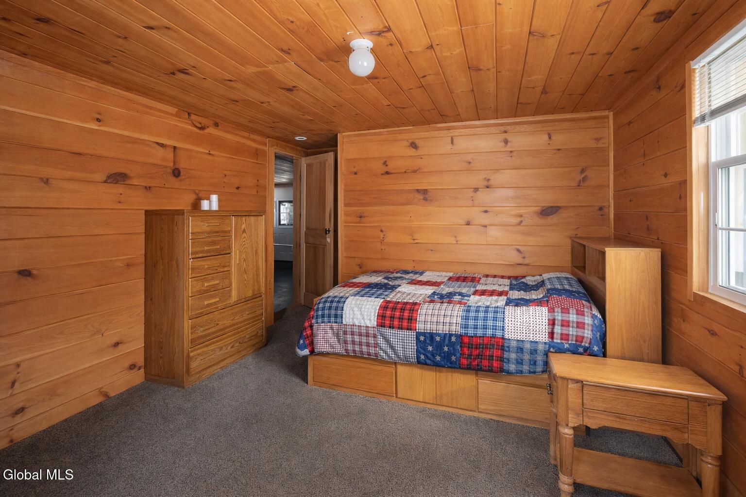 311 Corbin Hill Road Charleston, NY 12072 - Photo 13 of 42 Firefly_gpt-image_add a quilt to the bed