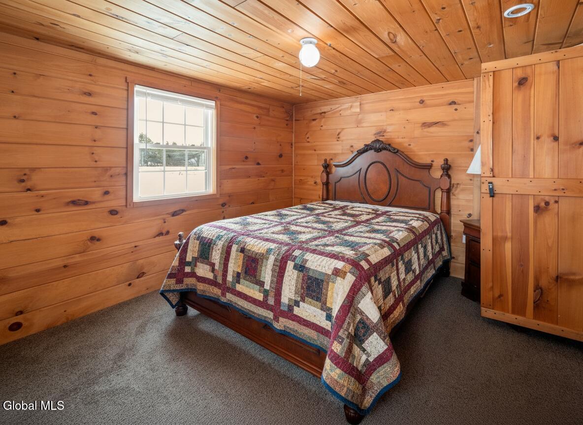 311 Corbin Hill Road Charleston, NY 12072 - Photo 14 of 42 Firefly_Gemini Flash_add a quilt to the