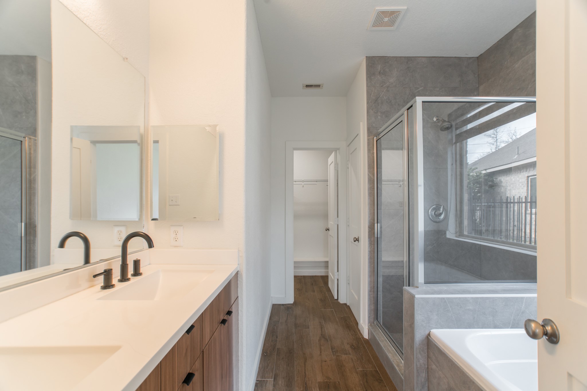 102 East Lasting Spring Circle Spring, TX 77389 - Photo 24 of 45 a bathroom with a sink and a mirror