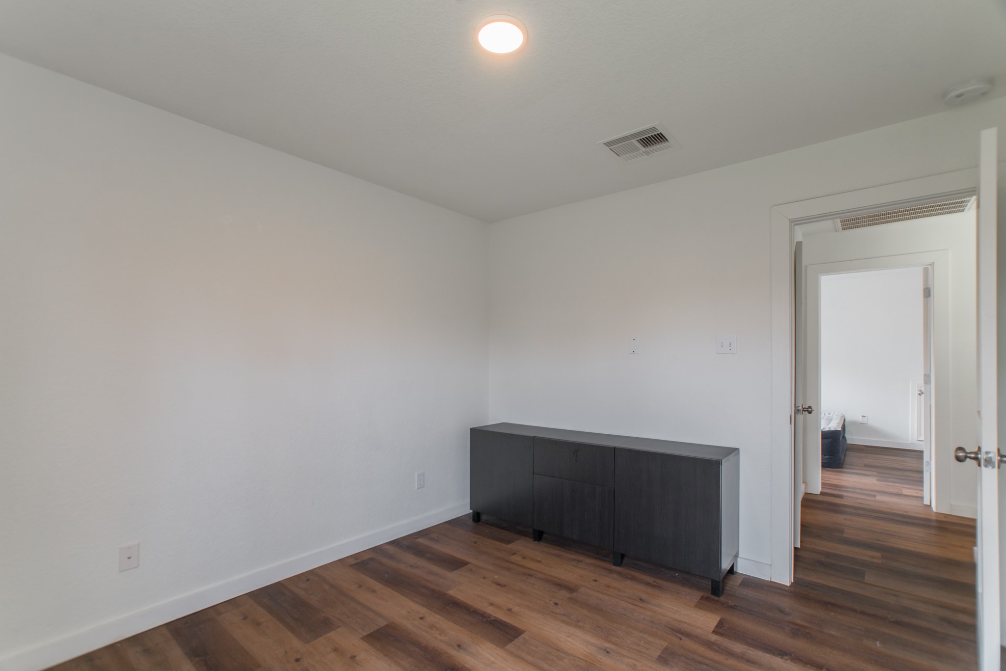 102 East Lasting Spring Circle Spring, TX 77389 - Photo 39 of 45 a view of empty room with wooden floor