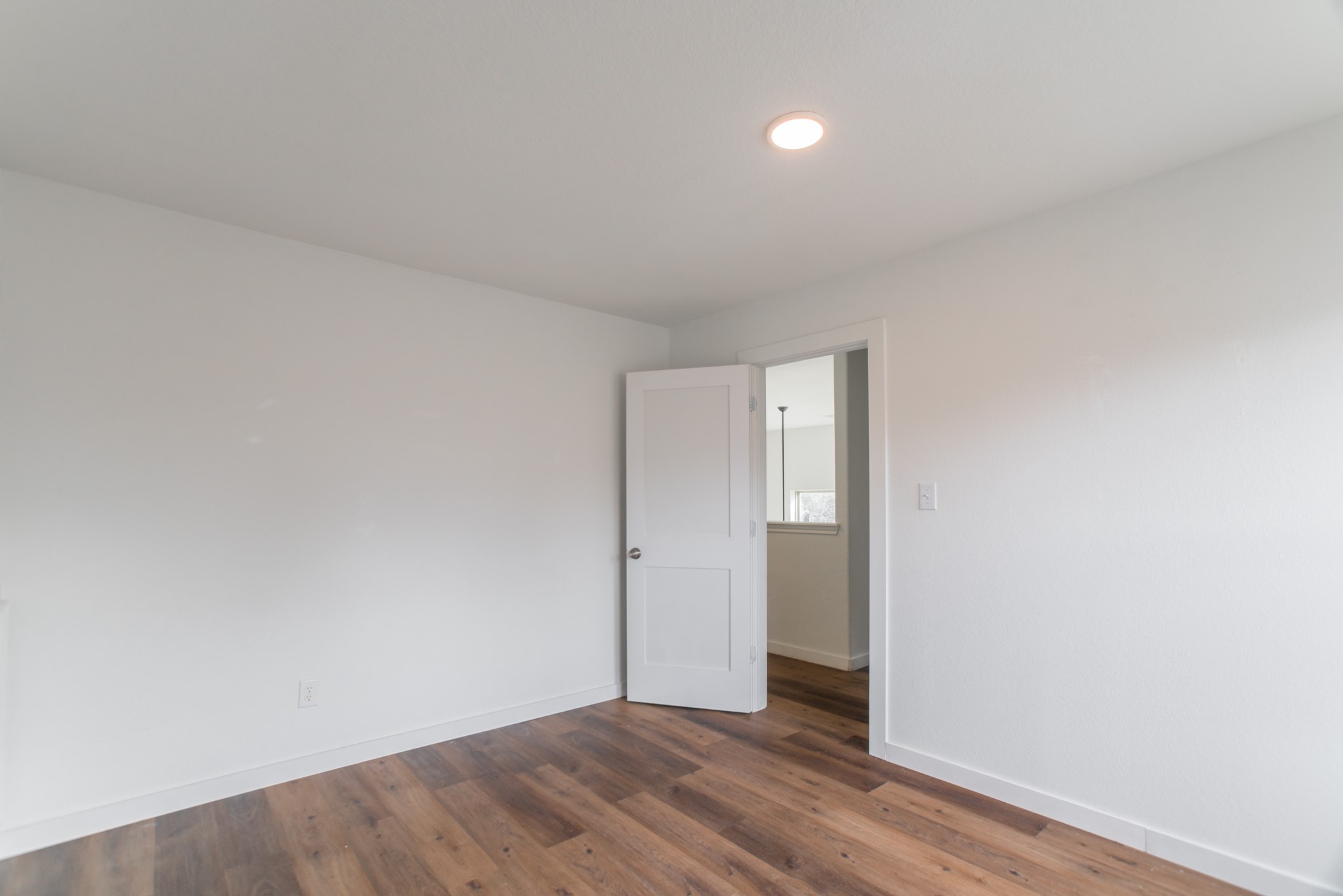 102 East Lasting Spring Circle Spring, TX 77389 - Photo 42 of 45 a view of an empty room with wooden floor