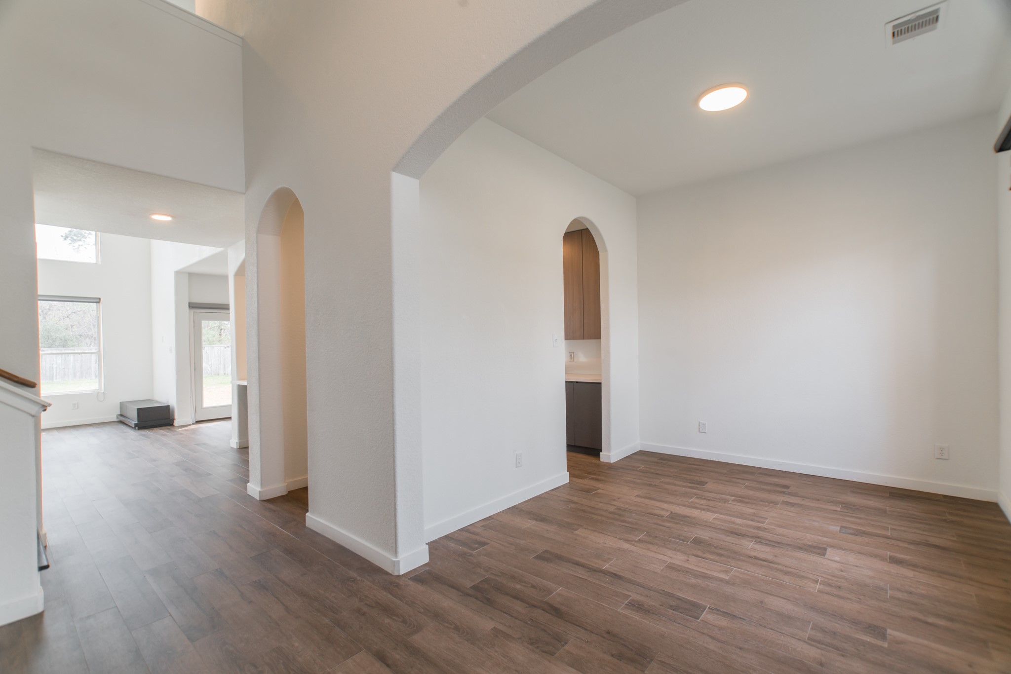 102 East Lasting Spring Circle Spring, TX 77389 - Photo 5 of 45 a view of a room with wooden floor and a window