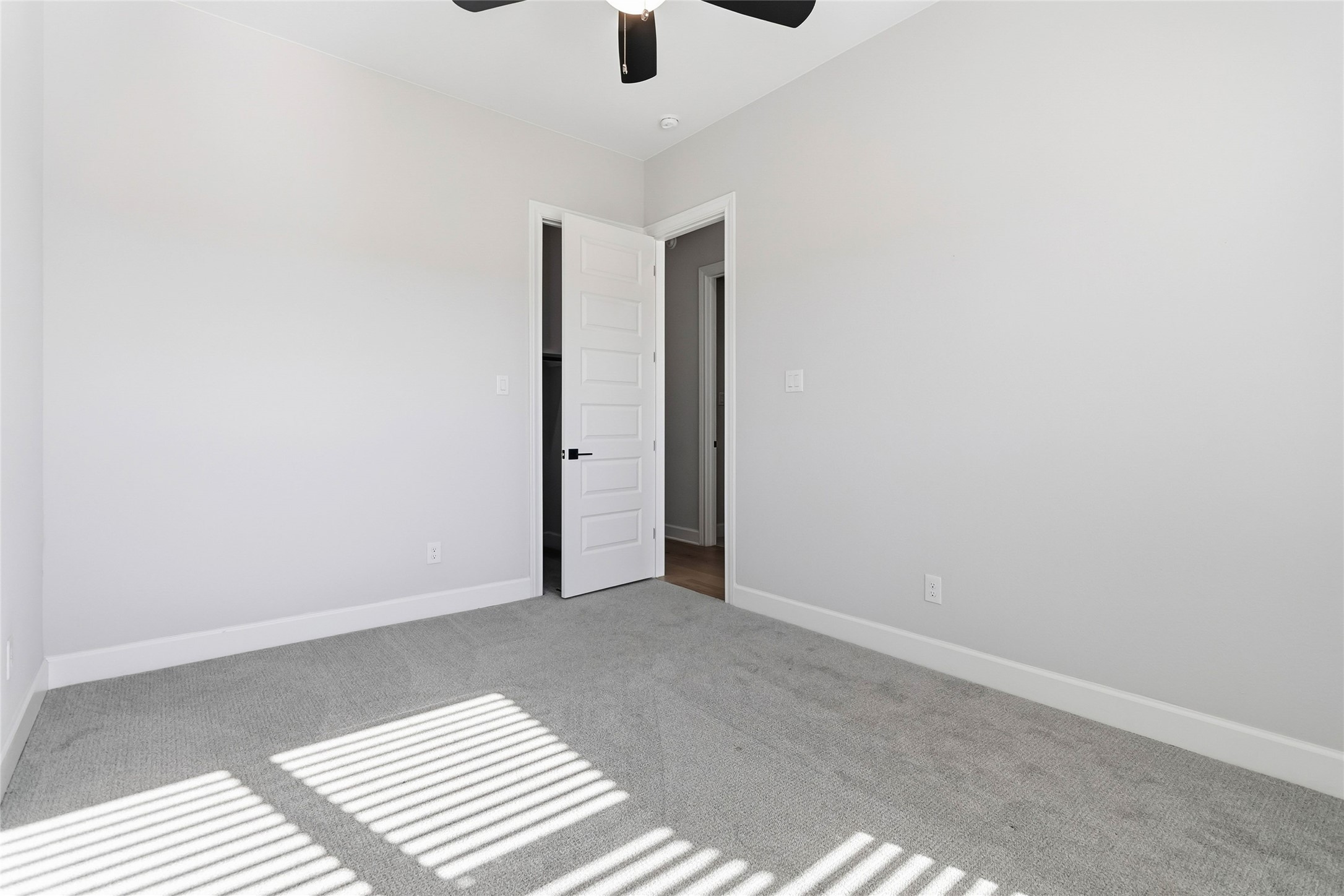 640 Prairie Clover Drive Dripping Springs, TX 78620 - Photo 23 of 32 Spare room with carpet and a ceiling fan