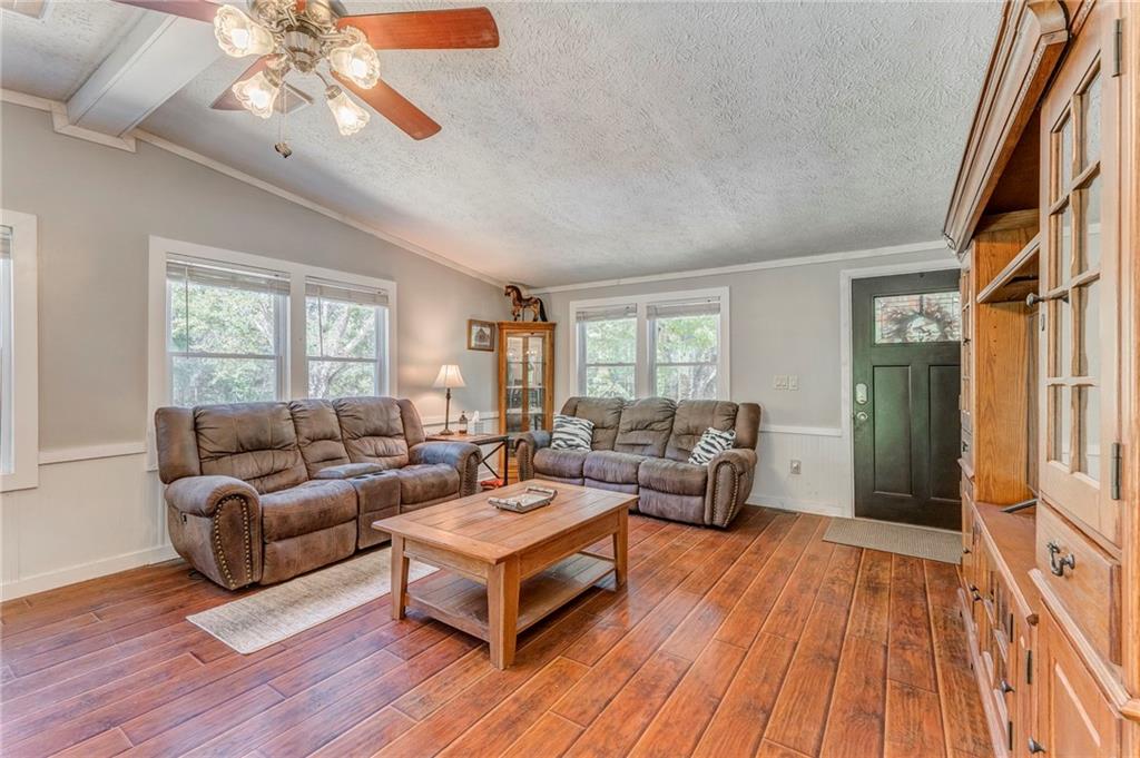 1039 Old Cedartown Road Rockmart, GA 30153 - Photo 11 of 40 a living room with furniture and a wooden floor