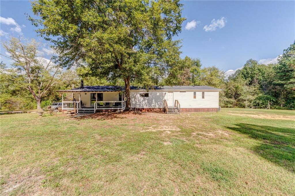 1039 Old Cedartown Road Rockmart, GA 30153 - Photo 38 of 40 a house view with swimming pool and sitting space