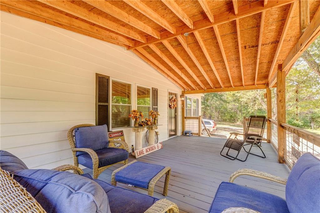 1039 Old Cedartown Road Rockmart, GA 30153 - Photo 7 of 40 a living room with furniture and a large window