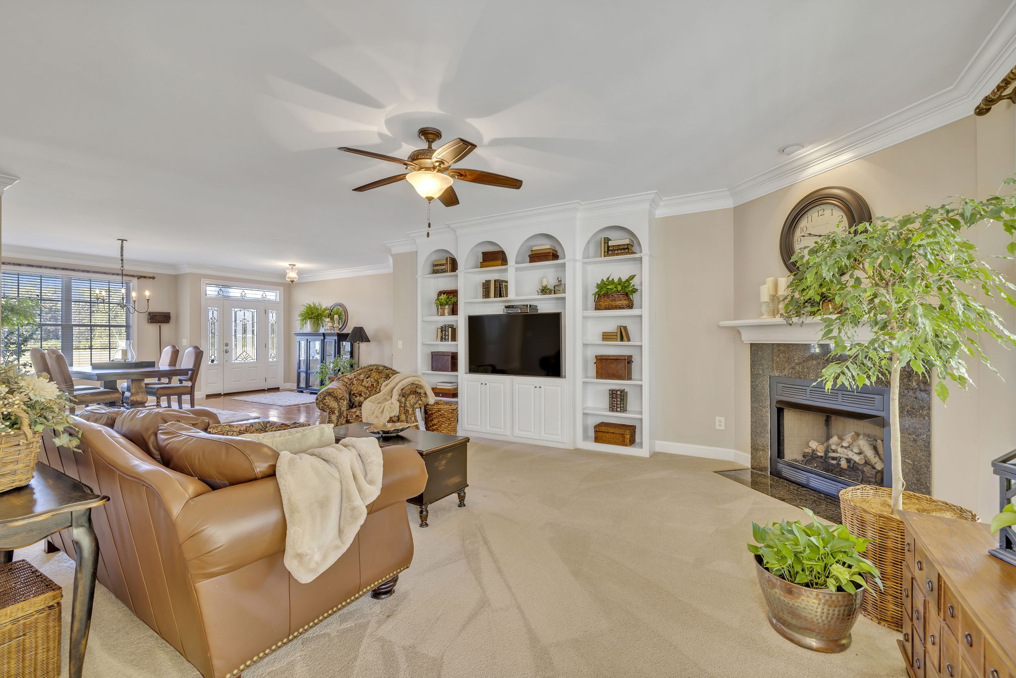3917 Buck Matthews Road Columbia, TN 38401 - Photo 13 of 60 a living room with furniture and a fireplace