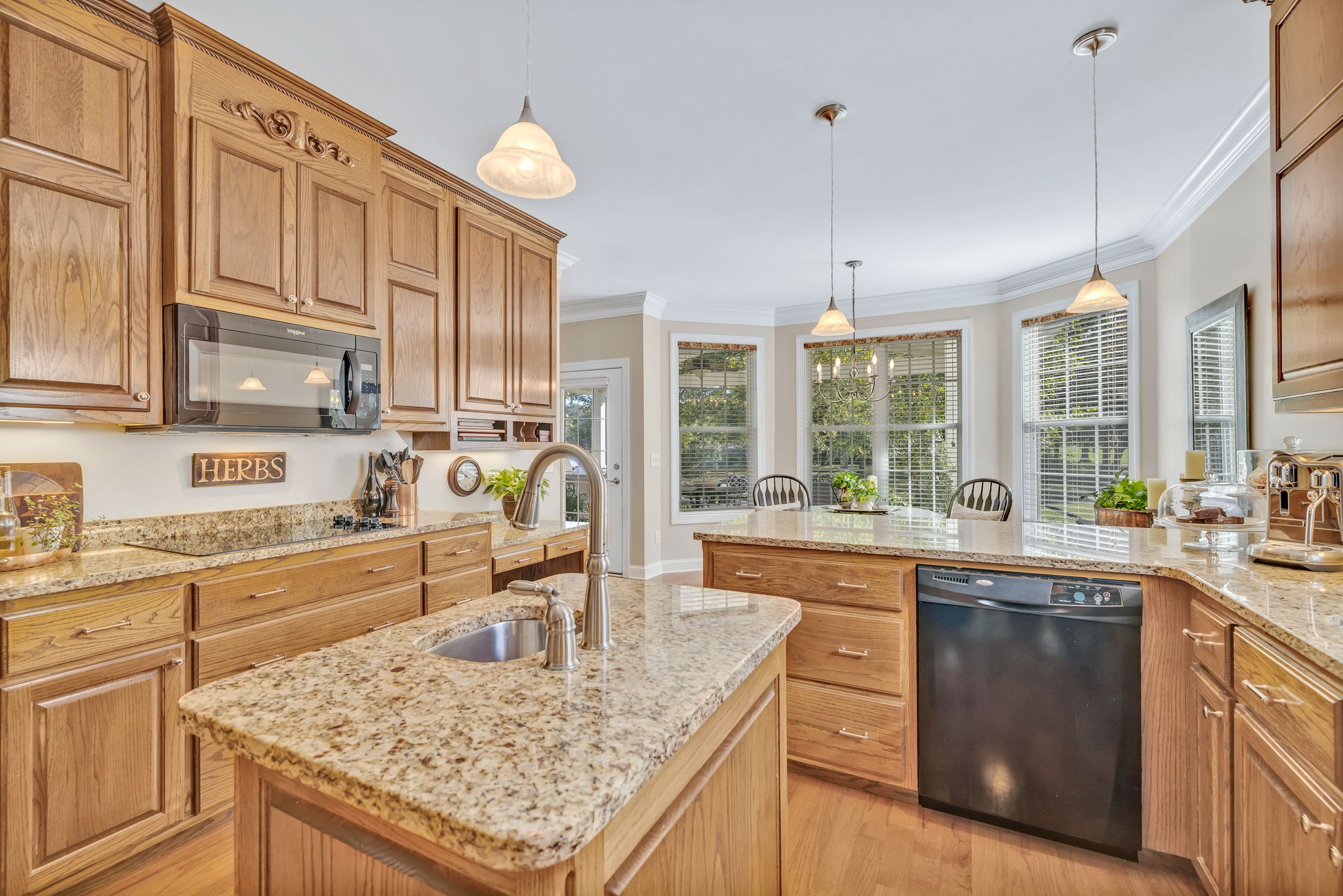 3917 Buck Matthews Road Columbia, TN 38401 - Photo 17 of 60 a kitchen with stainless steel appliances granite countertop a sink stove and refrigerator