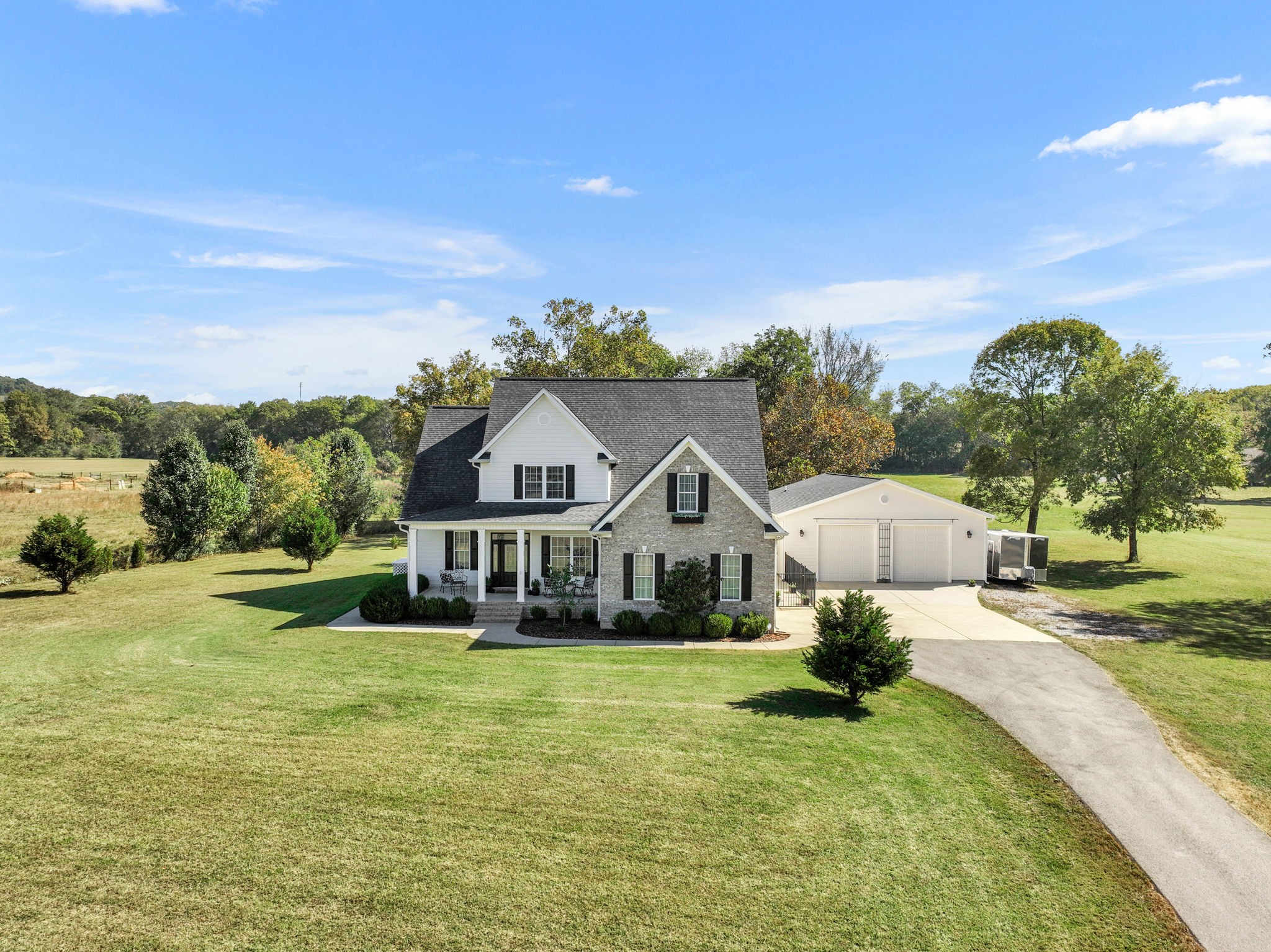 3917 Buck Matthews Road Columbia, TN 38401 - Photo 2 of 60 a view of a house with a big yard