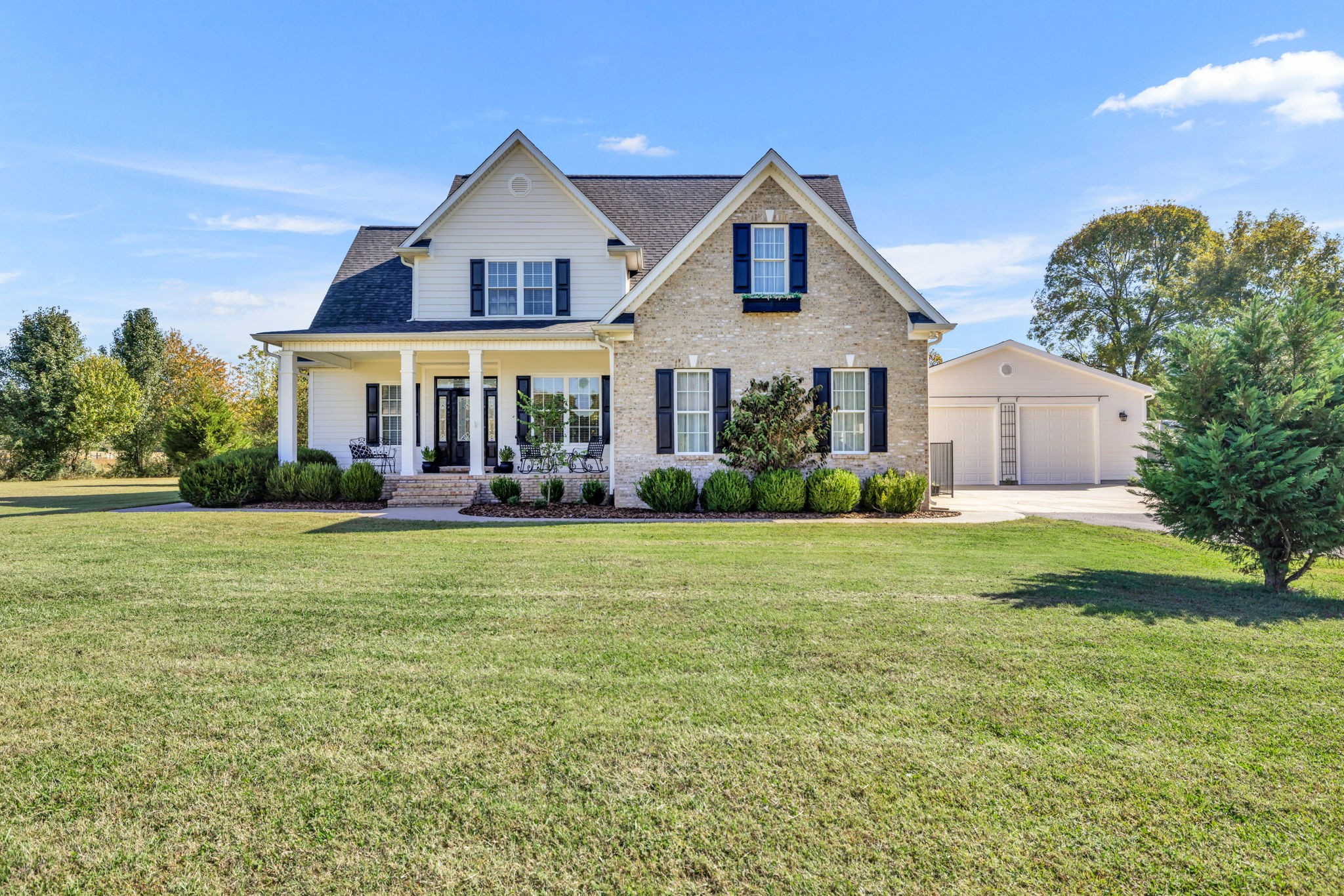 3917 Buck Matthews Road Columbia, TN 38401 - Photo 3 of 60 a front view of a house with garden