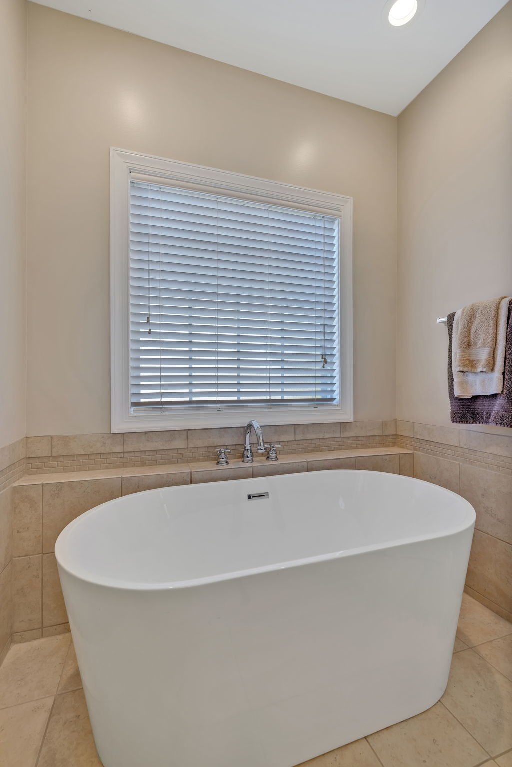 3917 Buck Matthews Road Columbia, TN 38401 - Photo 31 of 60 a white bath tub sitting in a bathroom