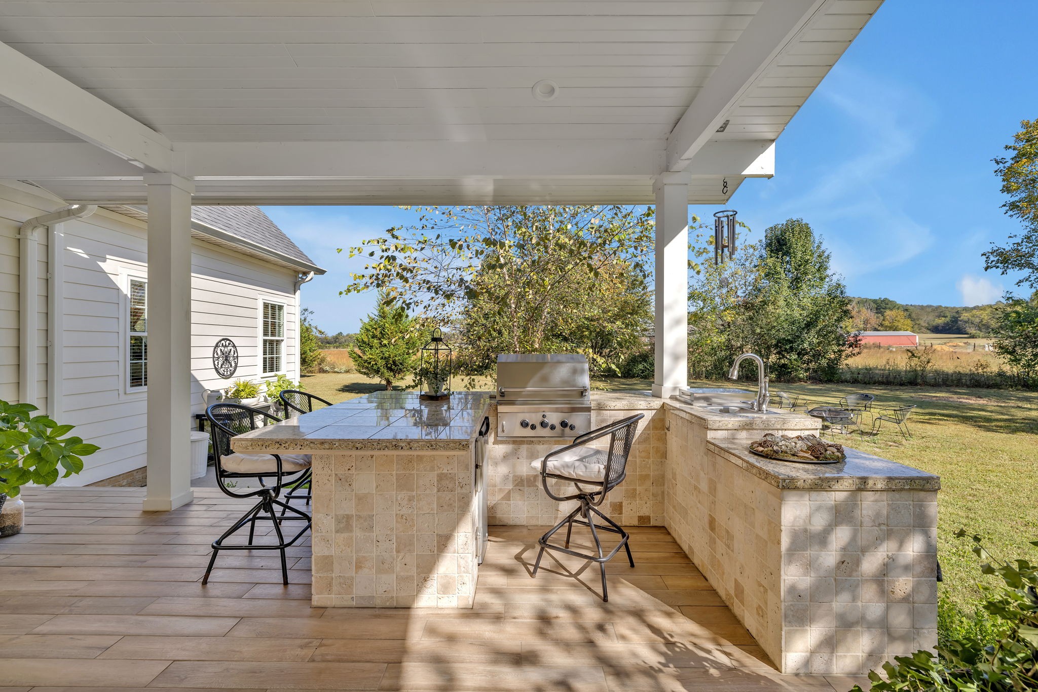 3917 Buck Matthews Road Columbia, TN 38401 - Photo 43 of 60 a living room with patio furniture and a floor to ceiling window