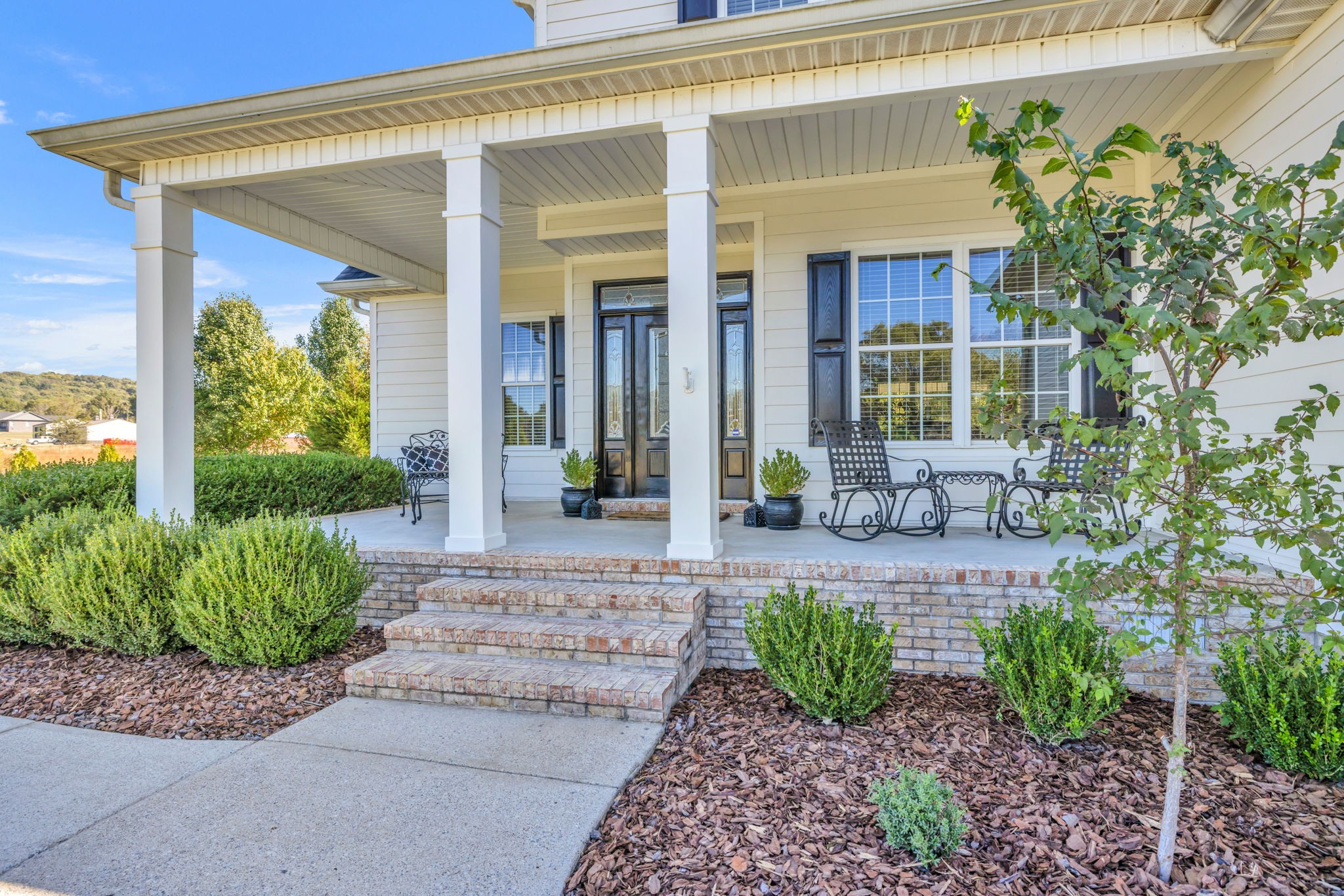 3917 Buck Matthews Road Columbia, TN 38401 - Photo 5 of 60 a front view of a house with garden