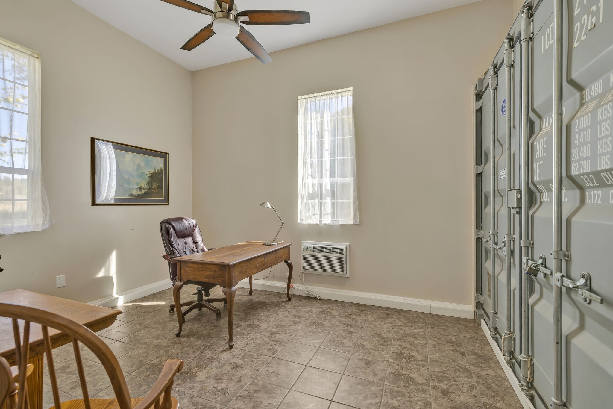 3917 Buck Matthews Road Columbia, TN 38401 - Photo 52 of 60 a workspace with chandelier