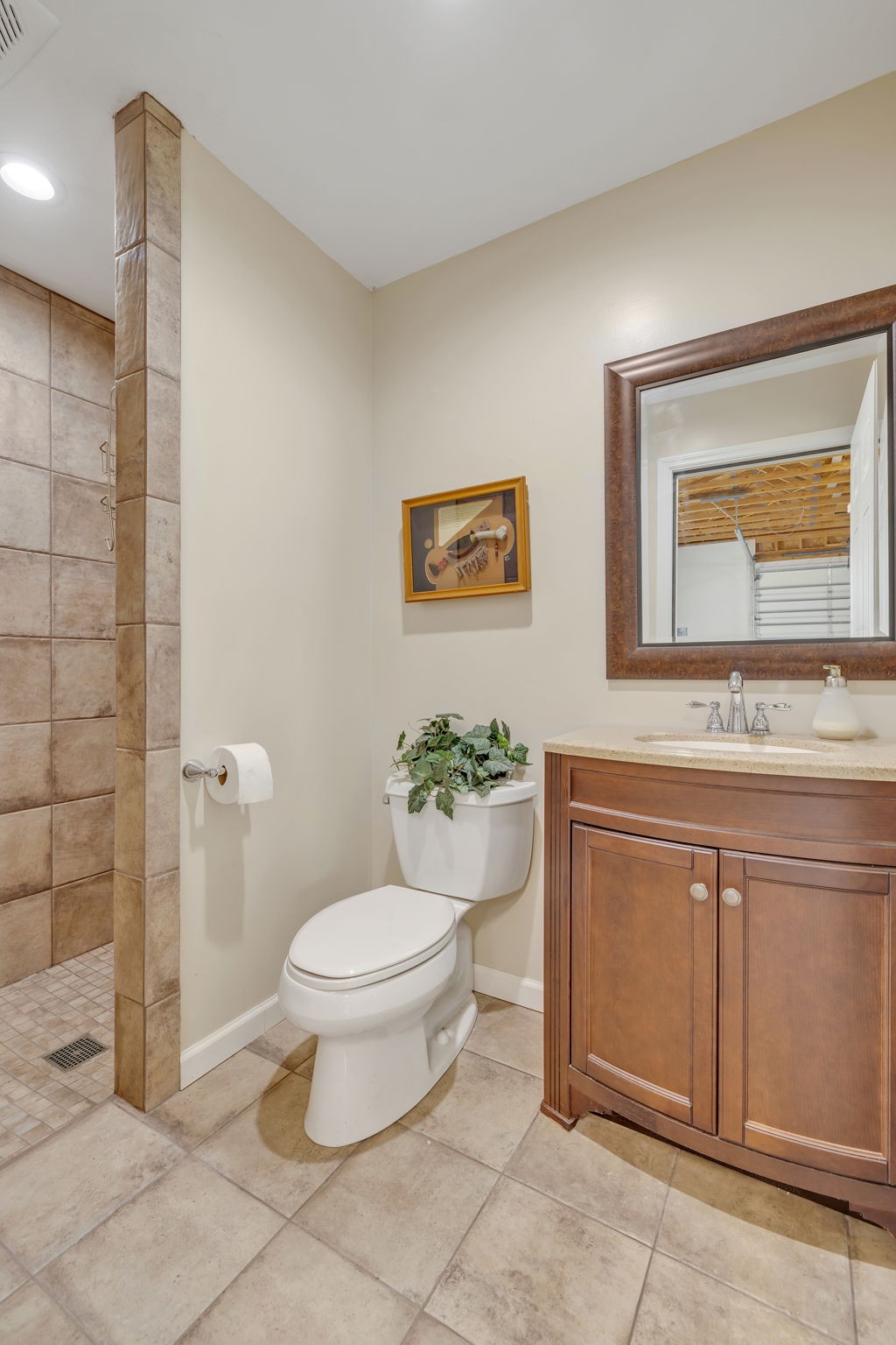 3917 Buck Matthews Road Columbia, TN 38401 - Photo 53 of 60 a bathroom with a toilet sink and mirror