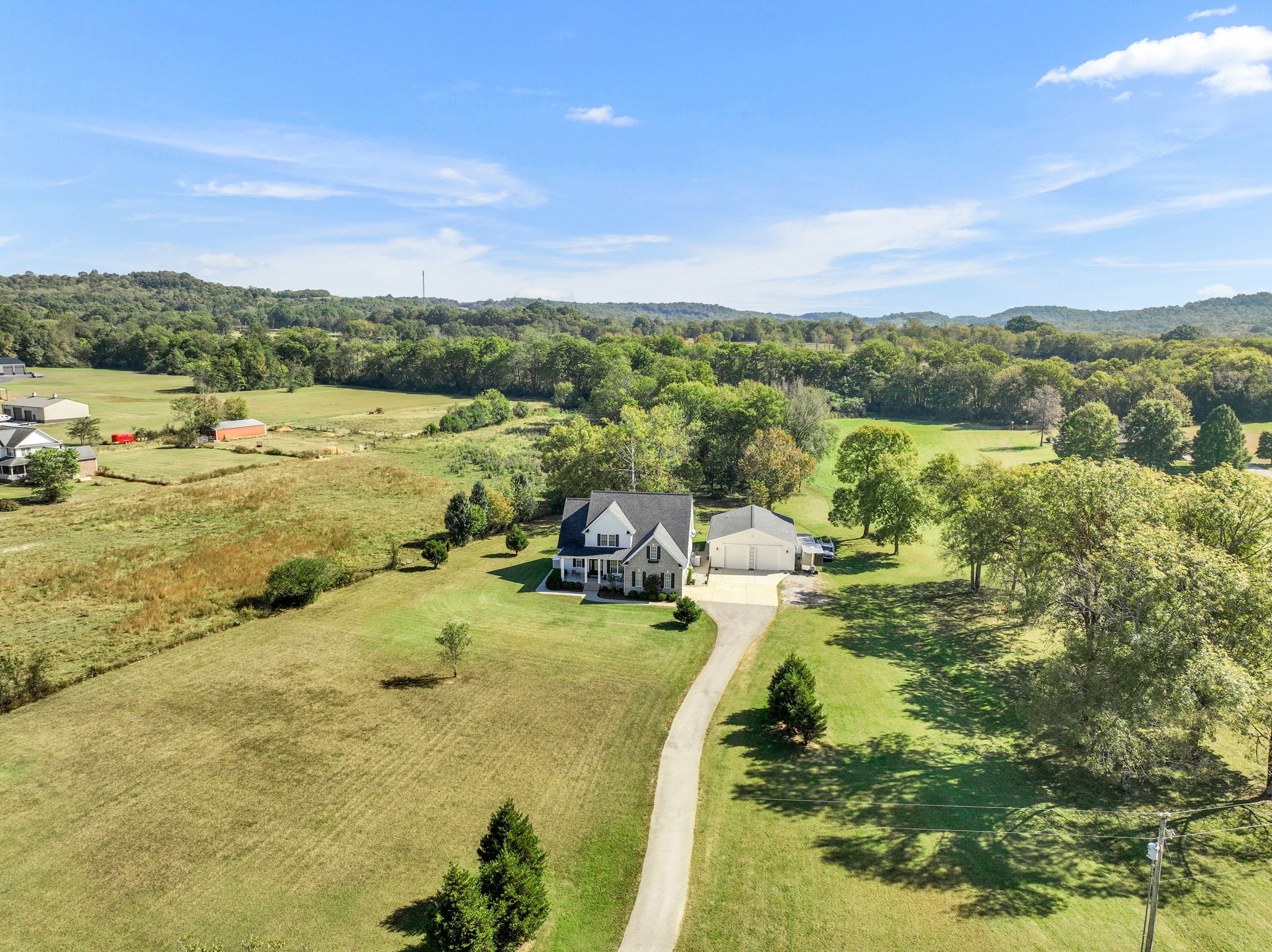 3917 Buck Matthews Road Columbia, TN 38401 - Photo 57 of 60 a view of a lake with houses in the back