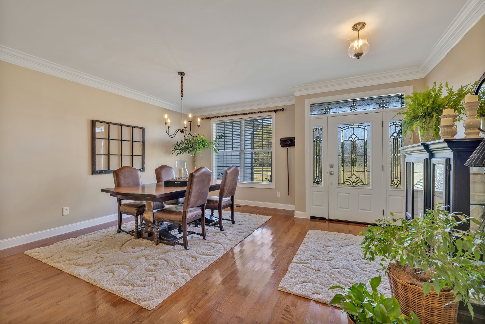 3917 Buck Matthews Road Columbia, TN 38401 - Photo 8 of 60 a view of a dining room with furniture window and wooden floor