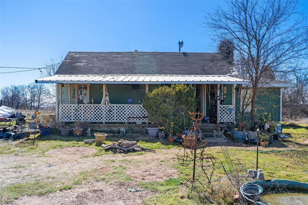 View of front of house with covered porch